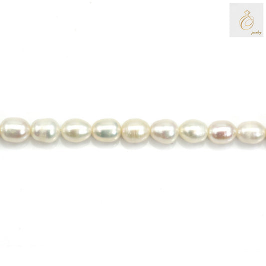 White freshwater cultured pearl strand, oval shaped pearls 5.5-6.5mm"
"Premium white freshwater pearl necklace strand 39-40cm length"
"Elegant oval white cultured pearls for jewelry making