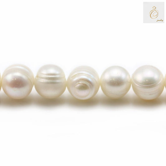 White freshwater cultured pearl strand with oval-shaped pearls measuring 9-10mm in diameter, displayed on neutral background