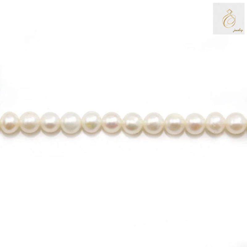 White freshwater cultured pearl strand, 4-5mm round pearls, 39-40cm length"
"Close-up of white freshwater pearls showing natural luster and round shape"
"Premium quality white freshwater cultured pearl necklace strand