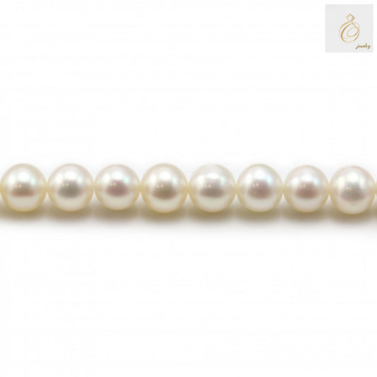 White freshwater cultured pearl strand, 6-7mm round pearls, 39-40cm length"
"Premium white freshwater pearls arranged in strand for jewelry making"
"Round white cultured pearls with natural luster, 6-7mm diameter