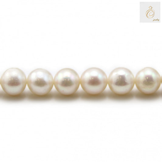 White freshwater cultured pearl strand, 7-8mm round pearls, 39-40cm length"
"Premium white freshwater pearls with lustrous finish, perfect for jewelry making"
"Round white cultured pearls arranged in strand, showing natural luster and quality
